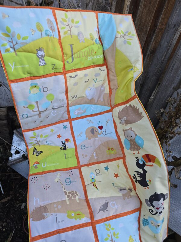 Lerndecke für englische Tierbegriffe. handmade Patchworkdesign Decke für Babys und Kleinkinder